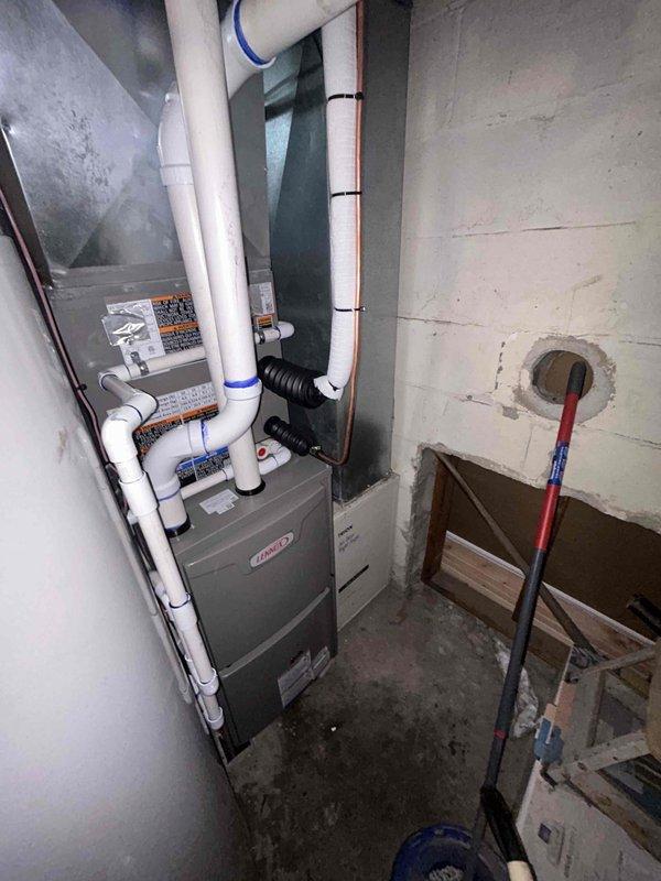 Completed full HVAC system installation including a 70,000 BTU furnace, 2-ton air conditioning unit with rear discharge configuration, and whole-home humidifier. Installed all necessary PVC venting, electrical connections, and ductwork modifications to accommodate new equipment. Reconnected existing systems, completed mechanical and electrical permits, and filled out gas utility rebate documentation for customer submission.