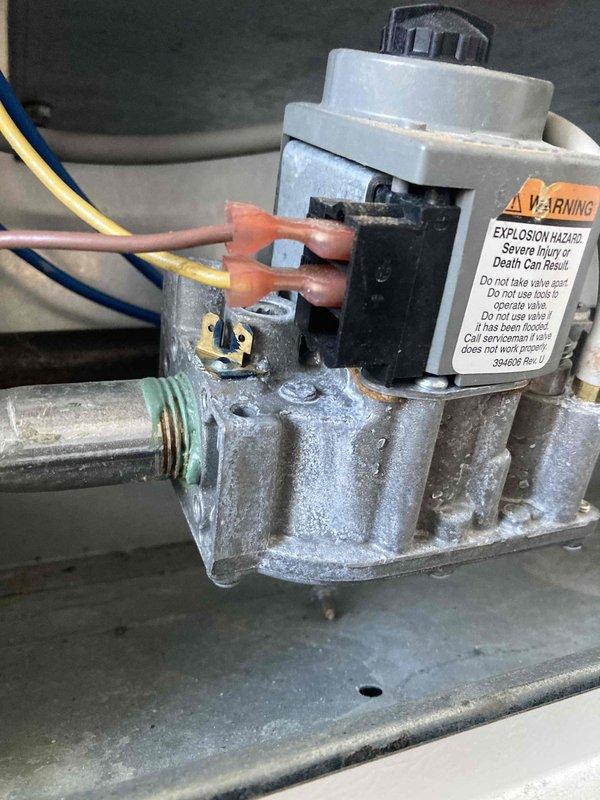 Completed preventive maintenance tune-up on gas furnace system. Inspected gas valve assembly, verified proper electrical connections and wiring integrity, and examined condensate drain piping and fittings for signs of corrosion or leakage. All components found to be operating within normal parameters with typical aging present on metallic surfaces.