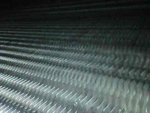 Completed scheduled preventive maintenance agreement visit for air conditioning system. Performed thorough inspection of condenser unit including examination of heat exchanger coil fins and verification of unit level positioning. Coil fins showed minor dust accumulation but remained in serviceable condition with proper airflow clearance. Confirmed outdoor unit maintains proper horizontal alignment and mounting stability. All system components operating within normal parameters at time of inspection.
