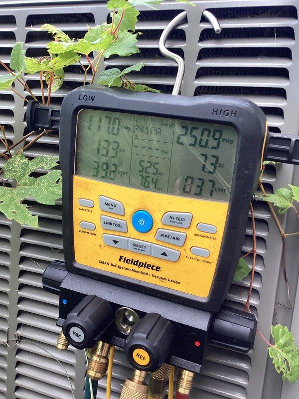 Completed prepaid air conditioning tune-up maintenance on a Lennox system with model ML180UH110E60C-5S. Performed comprehensive system inspection, recorded refrigerant pressures and temperatures using digital manifold gauges, verified proper system operation with readings showing 170 PSI high side, 133 PSI low side, and temperature differential of 18.1 degrees. All components inspected and found operating within normal parameters with no issues identified.