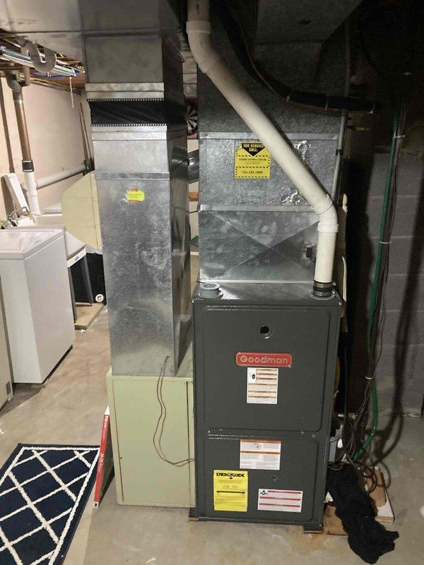 # Emergency No-Heat Call - 10-Year-Old Goodman Furnace

Responded to emergency service call for non-operational furnace in residential basement. Upon arrival, inspected 10-year-old Goodman gas furnace unit and associated HVAC system components. Performed diagnostic troubleshooting to identify cause of heating failure. Checked thermostat operation, verified gas supply to unit via flexible gas line connection, and inspected electrical connections. Examined furnace control board, ignition system, and flame sensor for proper functionality. Assessed air filter condition and verified adequate airflow through ductwork system. Tested safety switches including limit switches and pressure switches. Inspected condensate drain lines and PVC venting system for proper operation and blockages. Completed necessary repairs to restore heating operation. Cycled unit through multiple heating cycles to confirm proper ignition sequence, burner operation, and heat delivery through supply ductwork. Verified a