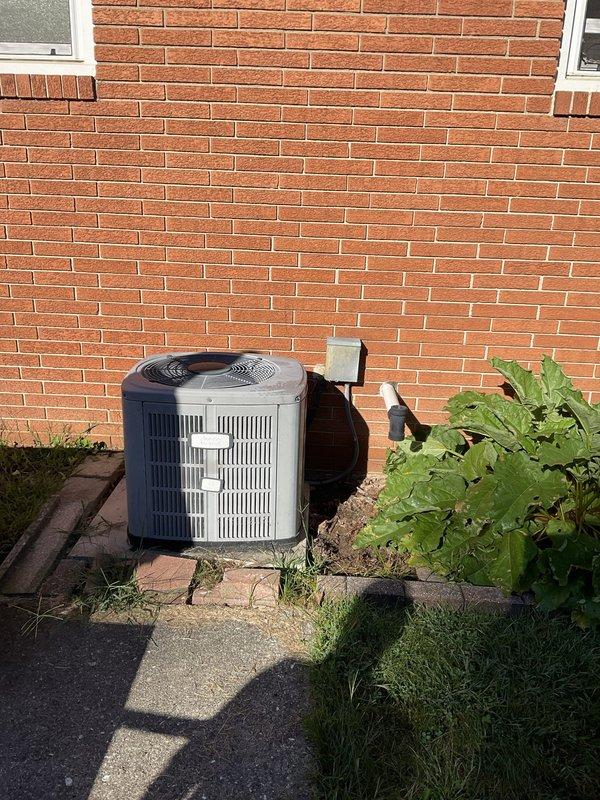 Conducted comprehensive assessment of aging HVAC system with failed control board and blower motor on furnace unit, and evaluated 2003-model air conditioning condenser operating on R22 refrigerant. Documented equipment conditions, recorded model and serial numbers from both indoor and outdoor units, and provided replacement estimate for complete system upgrade due to obsolete refrigerant and multiple component failures making repairs uneconomical.