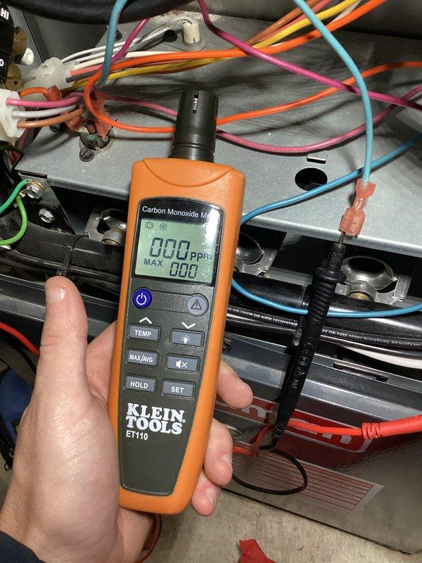 Performed routine HVAC maintenance inspection on Goodman heating unit as part of agreement visit. Conducted safety diagnostics including carbon monoxide testing at heat exchanger and flue areas, with readings confirming safe operation at 0.0 ppm. Inspected all electrical connections, control wiring, and gas line connections for proper installation and security.