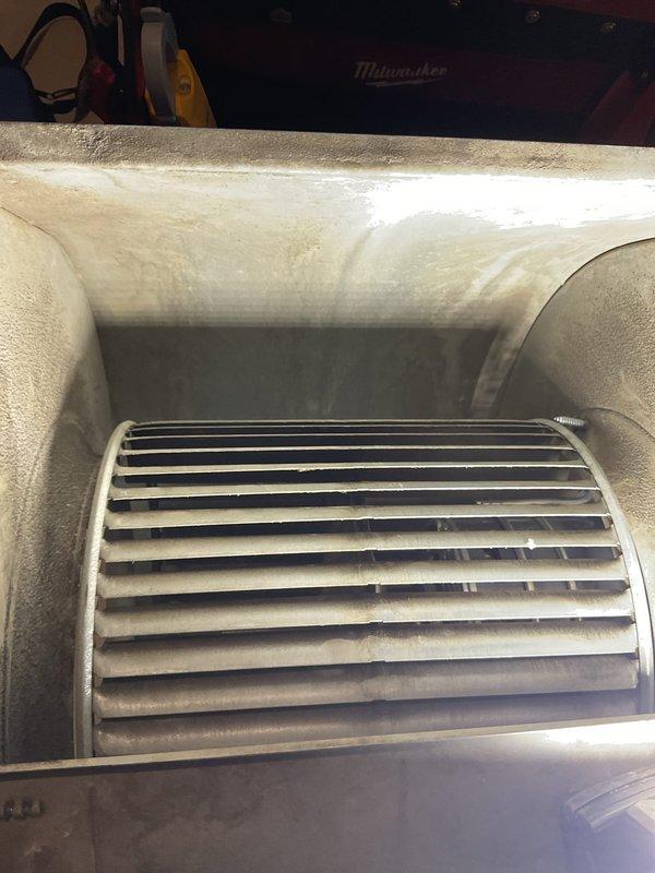 Completed preventive maintenance tune-up on furnace and air conditioning system. Inspected and serviced air handler unit, including examination of blower assembly and circular pleated air filter which showed moderate dust accumulation from normal operation. Verified all mechanical components, ductwork connections, and system housing for proper operation and cleanliness standards.