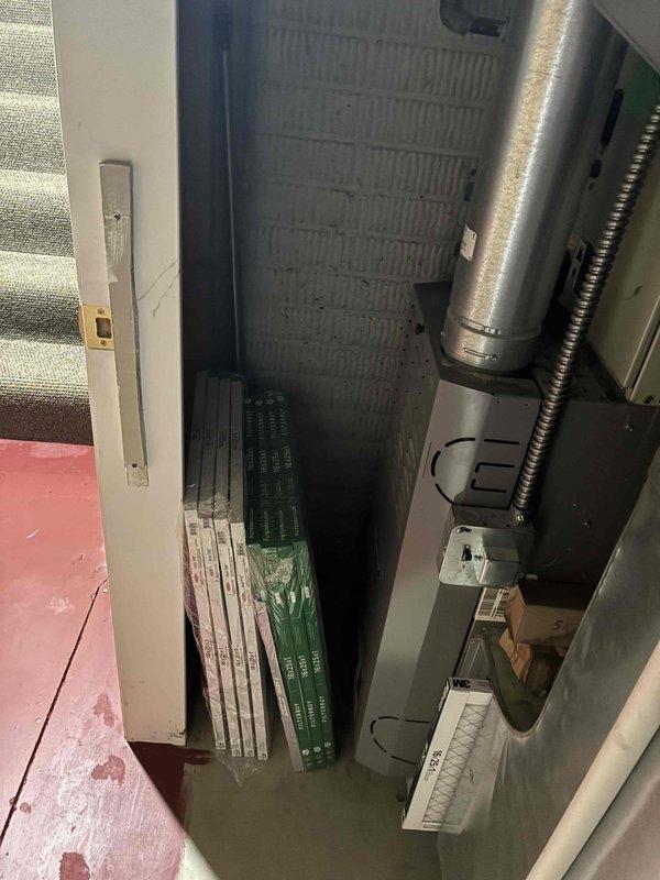 Provided estimate for complete HVAC system replacement in basement location, accessed through garage entry. Current 20-year-old air conditioning unit is non-operational. Evaluated existing natural gas furnace, air conditioning system, electrical panel with adequate breaker capacity, and ductwork configuration including filter assembly and air handler installation requirements for replacement equipment.