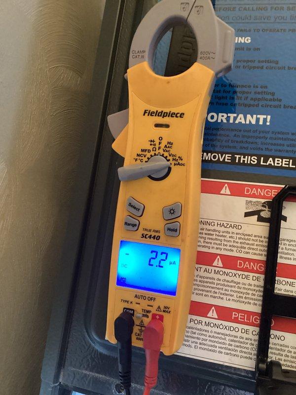 Responded to customer concern regarding thermostat malfunction during Club membership maintenance visit. Performed comprehensive system diagnostics including carbon monoxide testing using calibrated Klein Tools ET110 meter, which confirmed safe levels at 0 ppm throughout the equipment. Conducted electrical current measurements on heating system components using Fieldpiece SC440 clamp meter, recording 2.2 microamps during operational testing to verify proper electrical performance and identify potential thermostat control issues.