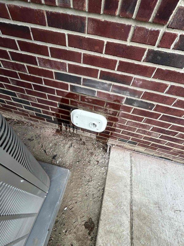 Responded to callback for venting termination issue on exterior wall. Corrected the outside termination point where exhaust venting exits through brick foundation, ensuring proper mounting and seal of the termination plate against the wall surface. Verified venting system integrity and confirmed proper installation per manufacturer specifications.