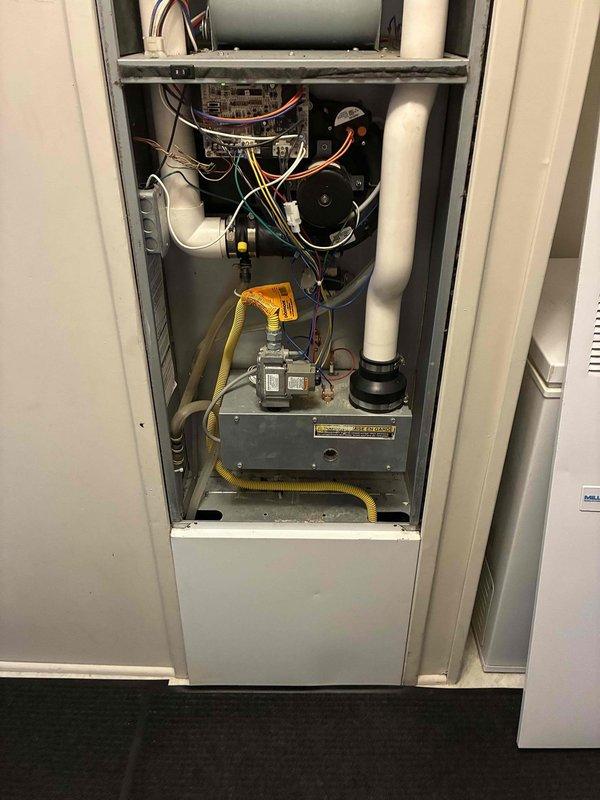 Responded to service call for failed heat exchanger evaluation and provided estimate for single component replacement. Upon arrival, contacted customer via provided phone number to confirm appointment window. Conducted thorough inspection of residential HVAC system, documenting electrical panel configuration showing furnace circuit identification and examining internal furnace components including blower assembly, control board wiring, gas valve assembly, and yellow flex gas line connections. Photographed system configuration and critical components to support estimate documentation for heat exchanger replacement recommendation.