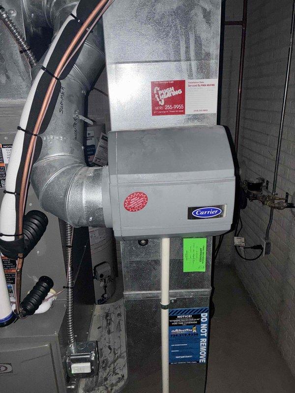 Completed full HVAC system installation including mechanical equipment only. Installed Carrier 70,000 BTU gas furnace with corresponding air handler in utility room, connected to existing ductwork with proper refrigerant line routing and secure fastening. Installed 3-ton air conditioning condenser unit in right side yard with copper line set connection to indoor unit. Replaced water heater with Bradford White unit, including proper venting through metallic flue pipe and copper supply line connections with shutoff valves. All equipment properly positioned, leveled, and secured per manufacturer specifications. Verified all gas connections, electrical hookups, and refrigerant lines properly installed and sealed. System reconnected to existing utilities and tested for proper operation.