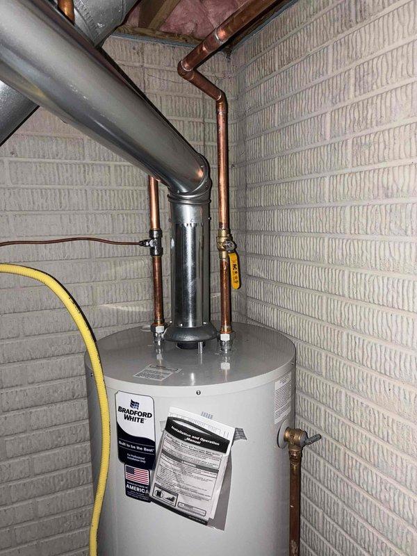 Completed full HVAC system installation including mechanical equipment only. Installed Carrier 70,000 BTU gas furnace with corresponding air handler in utility room, connected to existing ductwork with proper refrigerant line routing and secure fastening. Installed 3-ton air conditioning condenser unit in right side yard with copper line set connection to indoor unit. Replaced water heater with Bradford White unit, including proper venting through metallic flue pipe and copper supply line connections with shutoff valves. All equipment properly positioned, leveled, and secured per manufacturer specifications. Verified all gas connections, electrical hookups, and refrigerant lines properly installed and sealed. System reconnected to existing utilities and tested for proper operation.