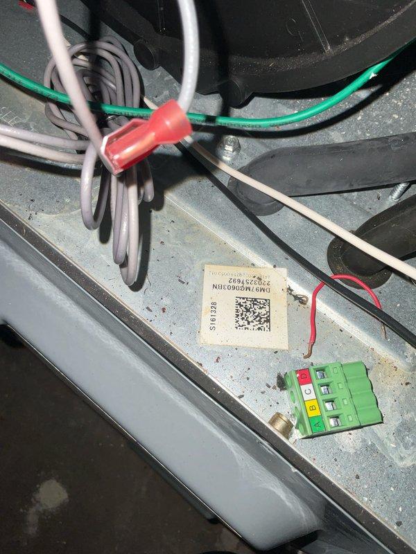 Completed routine HVAC maintenance tune-up as part of scheduled membership benefit visit with no reported issues or symptoms. Performed comprehensive system inspection including internal components, verified all electrical connections and wiring, inspected control board and capacitor, and documented equipment condition with photos of unit model S11U128 interior showing control components and wiring in satisfactory operating condition.