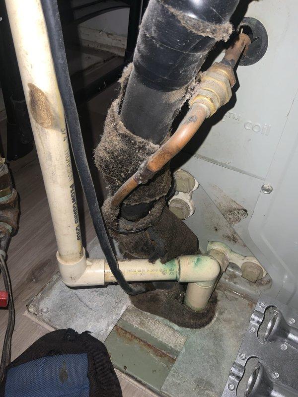 Completed routine HVAC heating maintenance tune-up as requested with no issues reported. Performed comprehensive system inspection including control board examination, electrical connections verification, and assessment of ductwork and piping components. Documented equipment condition with photos showing control panel circuitry and mechanical room components with noted dust accumulation on ductwork requiring future attention.