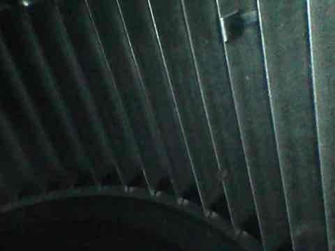 Responded to club heat/no heat service call and performed agreement visit inspection on air handler and system components. Upon inspection, evaporator coils were found to be in good operating condition with minimal dust accumulation on fin surfaces. Documented coil condition with photographs showing clean aluminum fins with proper spacing and no signs of damage, corrosion, or significant debris buildup that would restrict airflow or reduce system efficiency.