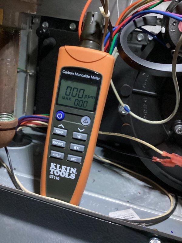 Completed Club Heat 10-2 preventive maintenance agreement visit on air handler and system inspection. Performed comprehensive safety testing including carbon monoxide level verification at equipment, which registered 0 ppm indicating proper combustion and no CO hazards present. Conducted system diagnostics using calibrated test instruments to measure operational parameters and verify equipment performance within manufacturer specifications. Inspected blower motor assembly, electrical connections, and control board wiring for proper operation and secure terminations. Documented all findings with photographic evidence for service records. System operating safely and efficiently with no deficiencies noted at time of inspection.