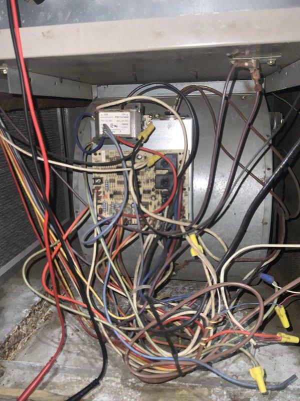 Responded to no-heat call on Goodman GMP125-5 furnace in basement. Customer had previously cleaned flame sensor, which allowed one ignition cycle before unit shut down again. Upon arrival, performed comprehensive diagnostic including thermostat verification, gas valve operation testing, and flame sensor inspection. Found excessive dust accumulation on blower wheel and disorganized wiring connections in control compartment. Cleaned and serviced blower assembly, secured loose electrical connections, and verified proper flame sensor positioning and cleanliness. Tested ignition sequence through multiple cycles to confirm reliable operation. System restored to full heating functionality with proper flame detection and consistent ignition.