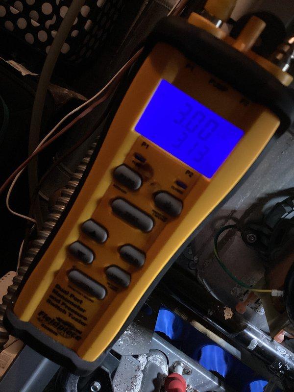 # HVAC Service Completed

Responded to no heat call on furnace over 10 years old with reported flame rollout and abnormal operating noise. Upon arrival, confirmed furnace was short cycling with ignition followed by immediate flame extinguishment while blower continued to run. Performed comprehensive diagnostic testing of heating system including combustion analysis and safety device inspection.

Utilized digital multimeter and carbon monoxide testing equipment to assess system operation and verify safe combustion conditions. CO readings confirmed at 0.00 ppm in ambient air around unit. Inspected burner assembly, flame sensor, gas valve operation, and ignition sequence. Examined blower motor assembly and verified electrical connections throughout system. Identified intermittent flame failure condition requiring component replacement and system recalibration.

System restored to proper operation with normal ignition sequence and stable flame. Verified all safety controls functioning corr