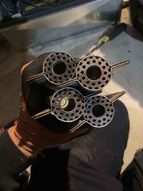 Completed routine heating maintenance tune-up for Comfort Club member with no reported issues. Performed comprehensive system inspection including burner assembly examination and blower motor evaluation, documenting component conditions with photographs. All heating system components found operating within normal parameters.