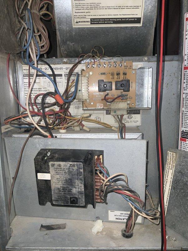 Responded to no heat call on furnace over 10 years old. Upon arrival, confirmed symptom of unit igniting normally but blower motor shutting off after approximately one minute while burners remained lit, creating an unsafe operating condition. Diagnosed failed blower motor and/or control board issue causing premature blower shutdown. Inspected blower assembly and found accumulated debris in wheel and housing contributing to motor strain. Examined control board and transformer for proper operation and wiring integrity. Provided repair estimate and discussed replacement options given age of equipment.