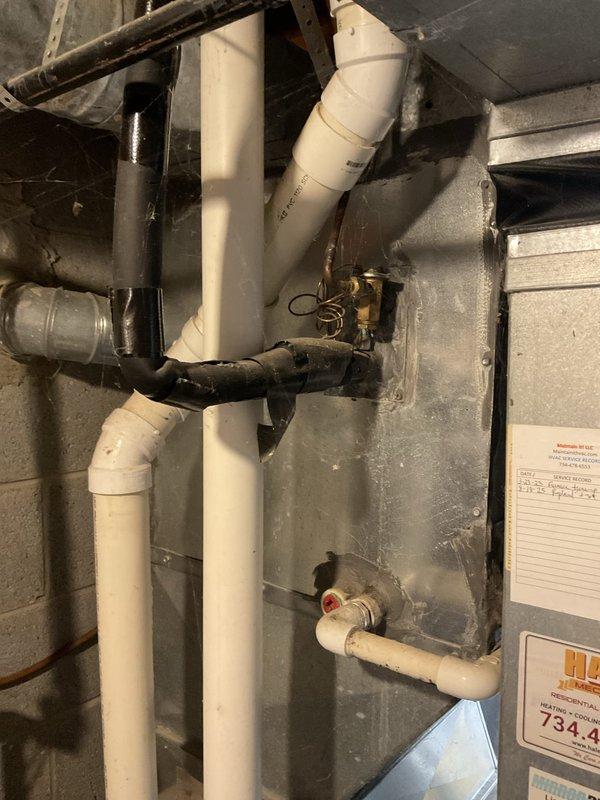 Conducted comprehensive HVAC system evaluation for air conditioning replacement estimate. Assessed existing operational unit confirmed to be of advanced age, documented current mechanical infrastructure including basement utility connections, existing plumbing interfaces, and electrical service panel capacity to determine compatibility requirements for new equipment installation.
