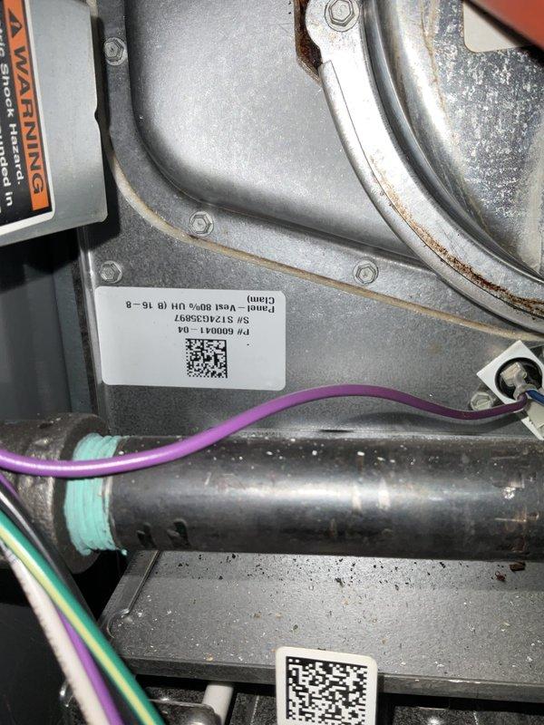 Completed annual HVAC maintenance tune-up as part of scheduled club membership visit with no reported issues from customer. Inspected and serviced air handler unit, documenting equipment specifications and verifying proper operation of all mechanical and electrical components. Identified corroded batteries in Honeywell Home thermostat model TH4110U2005 showing visible leakage and crystalline buildup on terminals; replaced batteries to ensure continued reliable thermostat operation and system control.