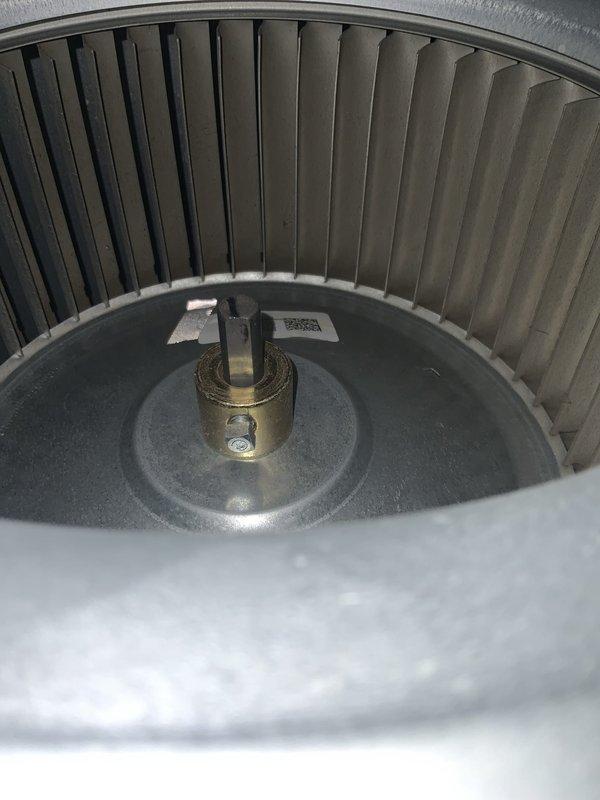 Completed preventative maintenance tune-up on residential furnace and air handler system per club membership agreement. Performed comprehensive inspection of blower assembly, motor components, and internal mechanical systems. Accessed furnace cabinet to verify proper operation of blower wheel, inspected motor housing and coupling mechanisms, and confirmed all components were functioning within normal parameters. Documented equipment condition through photographic records showing blower assembly with minor dust accumulation on vertical blades and overall system cleanliness. Verified PVC venting integrity and proper installation. No issues identified during inspection; system operating as designed with all safety controls functioning correctly.