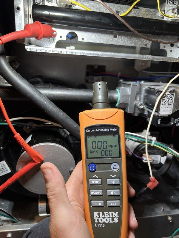 Completed CLUB HEAT 12-4 maintenance agreement visit on air handler and supplemental inspection. Performed comprehensive system diagnostics including carbon monoxide testing with readings at 0 ppm, confirming safe combustion and proper venting. Conducted electrical measurements using clamp meter to verify proper amperage draw and system performance. All components inspected and found operating within normal parameters.