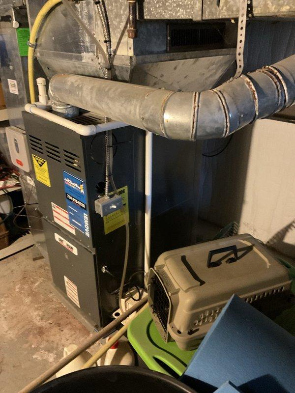 Responded to service call for non-operational furnace system. Upon arrival, performed diagnostic evaluation of gas furnace unit located in basement utility area. Confirmed customer report of failed ignition control board through visual inspection and system testing. Examined furnace control panel and identified damaged ignition control module preventing proper system startup and operation. 

Documented existing equipment configuration including furnace unit, ductwork connections, and venting system. Photographed current installation showing furnace placement, flexible duct connections to plenum assembly, and gas line routing for reference. Assessed overall system condition and compatibility requirements for replacement component.

Provided detailed estimate for ignition control board replacement including parts and labor. Reviewed repair options with customer considering time constraints for completion. Coordinated scheduling to accommodate customer availability window and work departu