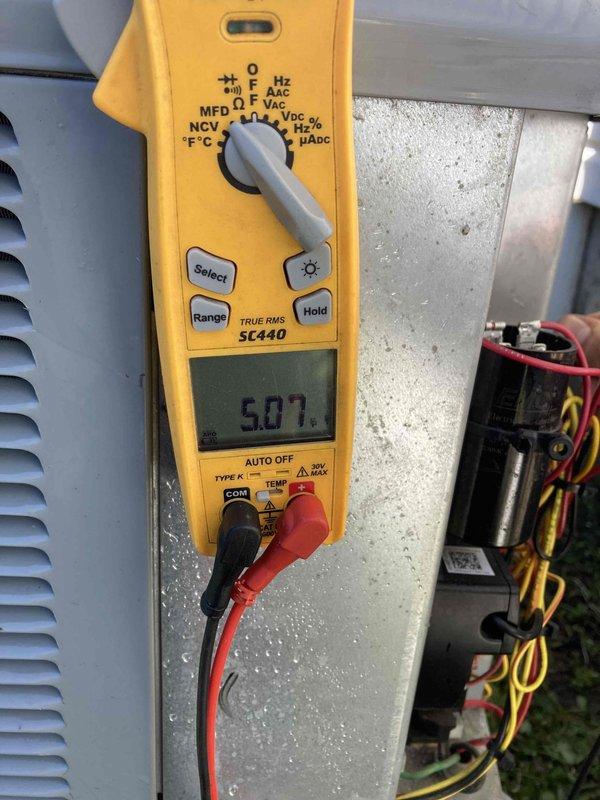 Completed seasonal maintenance agreement visit for AC and furnace system. Performed comprehensive diagnostics on HVAC control board using Fieldpiece SC440 multimeter, measuring electrical parameters including voltage readings of 12.82V and 5.07V at various test points to verify proper system operation. Inspected control board components, capacitor, and wiring connections to ensure all electrical systems were functioning within manufacturer specifications.