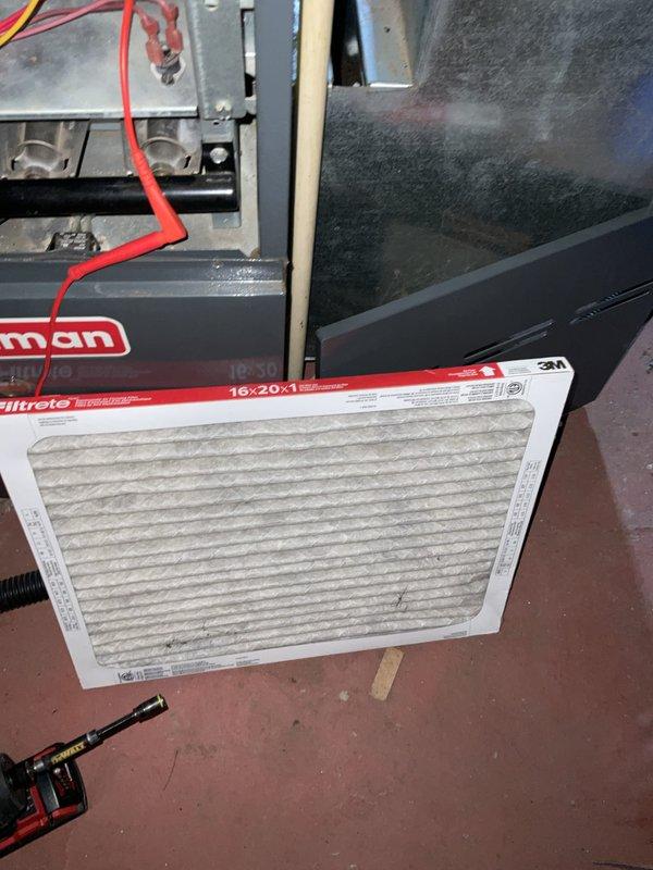 Completed preventive maintenance tune-up on residential HVAC system. Inspected and serviced unit components, checked electrical connections and wiring for proper operation. Evaluated existing 16x20x1 Filtrete air filter showing moderate dust accumulation and verified proper filter positioning within the air handler. Accessed internal components through service panel to perform standard maintenance procedures on heating and cooling equipment. System operational and running within normal parameters upon completion of service.