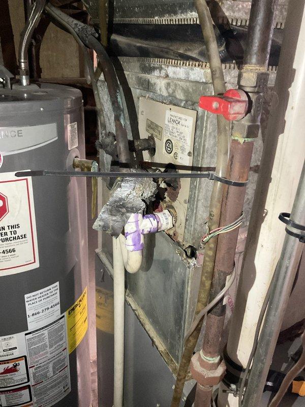 Provided comprehensive estimate for complete HVAC system replacement of 16-year-old non-operational furnace and associated equipment located in basement utility area. Assessed existing natural gas furnace, ductwork showing significant age and oxidation, and surrounding mechanical components to determine replacement specifications and installation requirements. Documented current equipment configuration, including deteriorated metal housing, aged ductwork system, and attic insulation conditions to develop accurate proposal for new high-efficiency heating system installation.