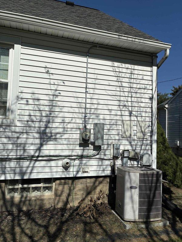 Conducted on-site assessment for air conditioning system replacement at residential property. Evaluated existing outdoor condensing unit and inspected attic space for potential mini-split installation options as previously discussed with homeowner. Documented current equipment configuration, electrical service connections, and interior space constraints to provide comprehensive replacement quote including both traditional central air and ductless mini-split system alternatives.