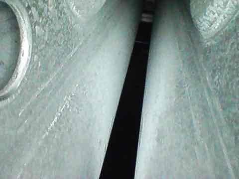 Completed furnace tune-up on 7-year-old unit with no reported issues. During inspection, discovered significant frost and ice accumulation on evaporator coil and ductwork components, indicating potential airflow restriction or refrigerant issue requiring further diagnostic evaluation. Evaluated thermostat operation per customer request; unit functioning within normal parameters at time of service.