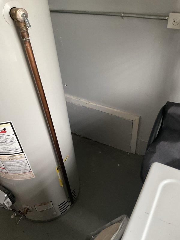 Conducted on-site evaluation for HVAC system replacement estimate on 26-year-old equipment utilizing natural gas fuel source. Assessed existing furnace and related components located in basement utility area, documented current system configuration including gas meter installation, venting arrangement, and electrical connections to provide comprehensive replacement specifications for comfort advisor consultation.