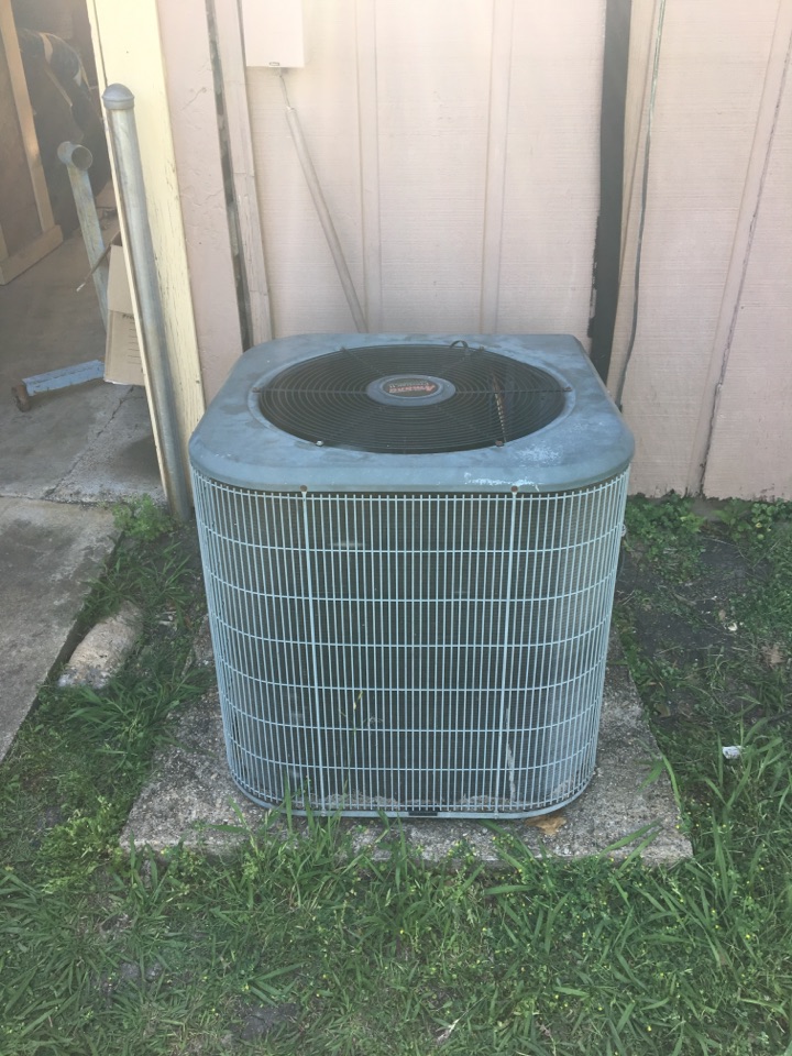 Repairing an Amana air conditioner in Howe, Texas..