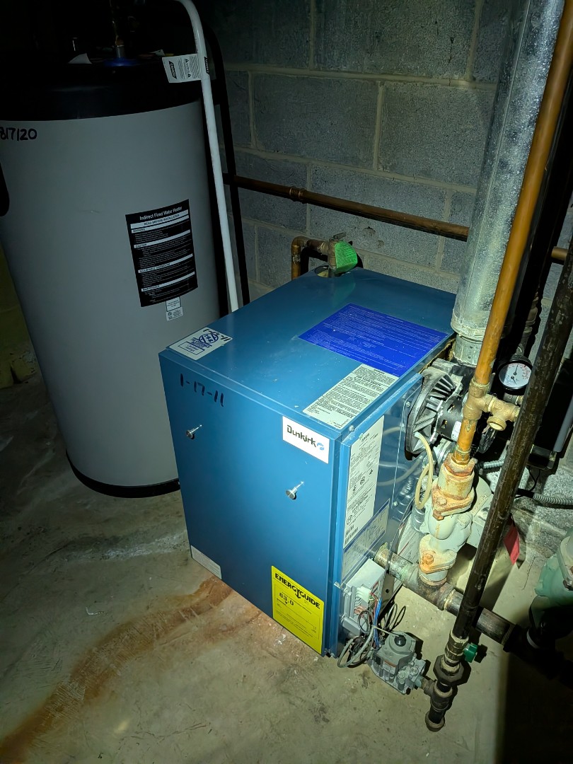 Routine service on hot water boiler.