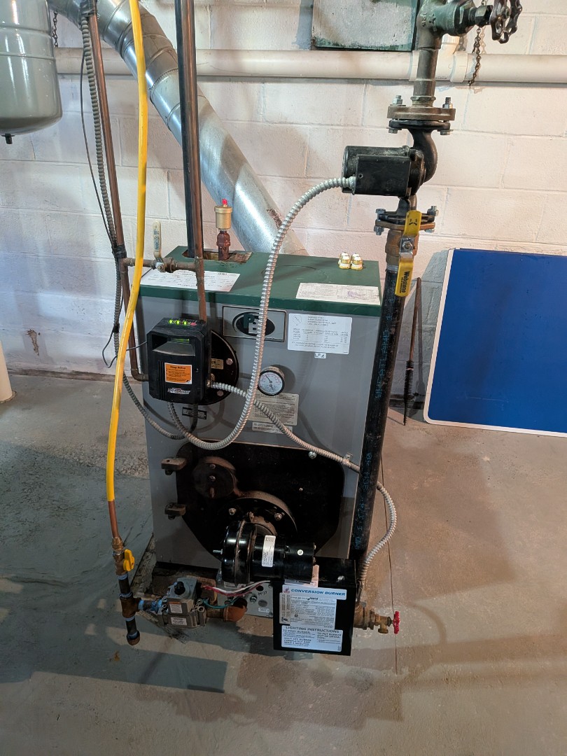 Routine hot water boiler service 