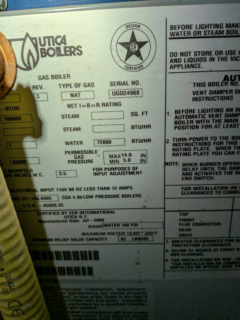 Routine maintenance on gas hot water boiler and hot water heater 