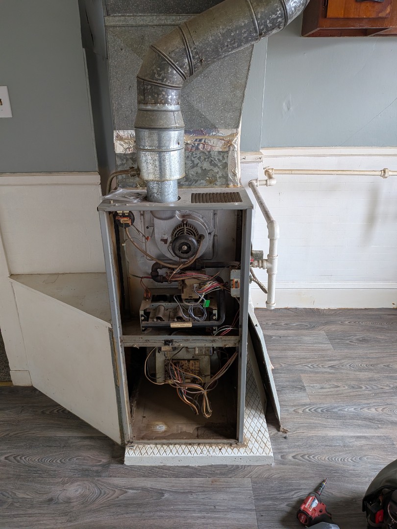 Heating service - Comfortmaker gas forced air furnace cleaning and service.