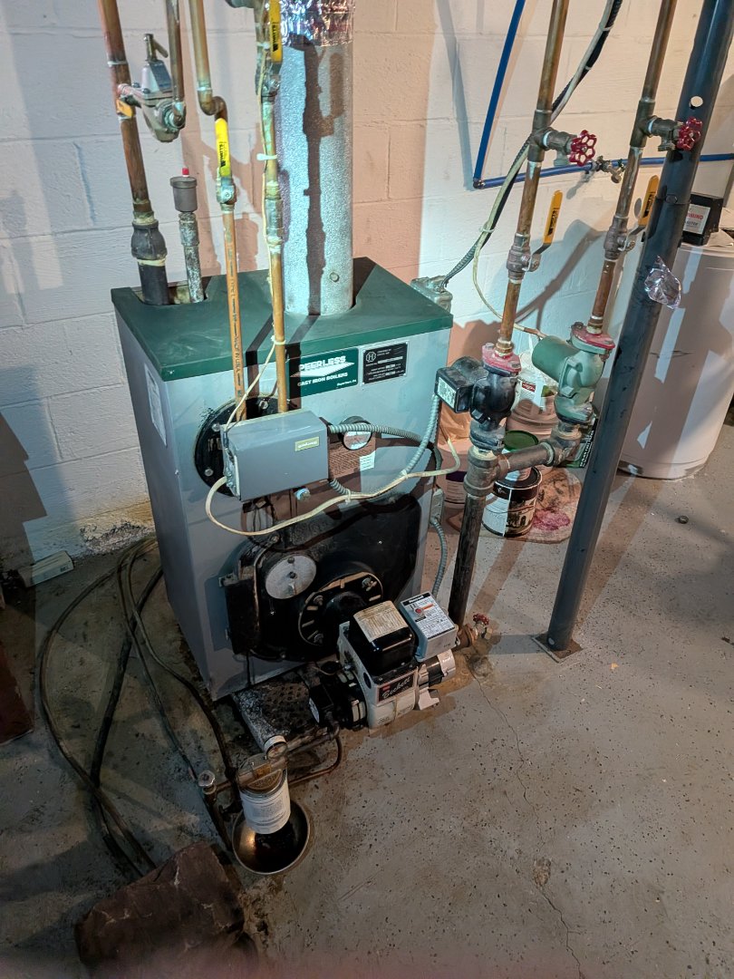 heating service- oil fired Peerless Hot water boiler maintenance.