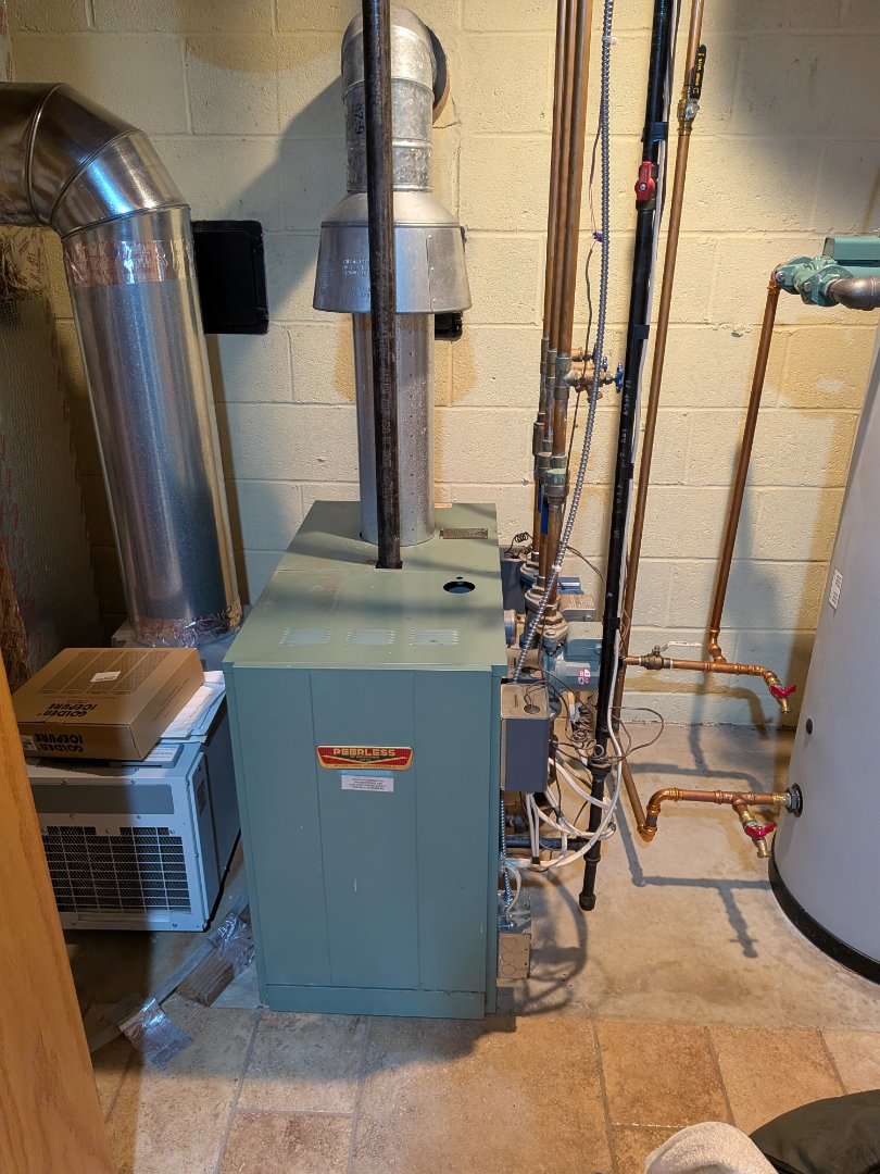 Heating service- Peerless gas hot water boiler maintenance.