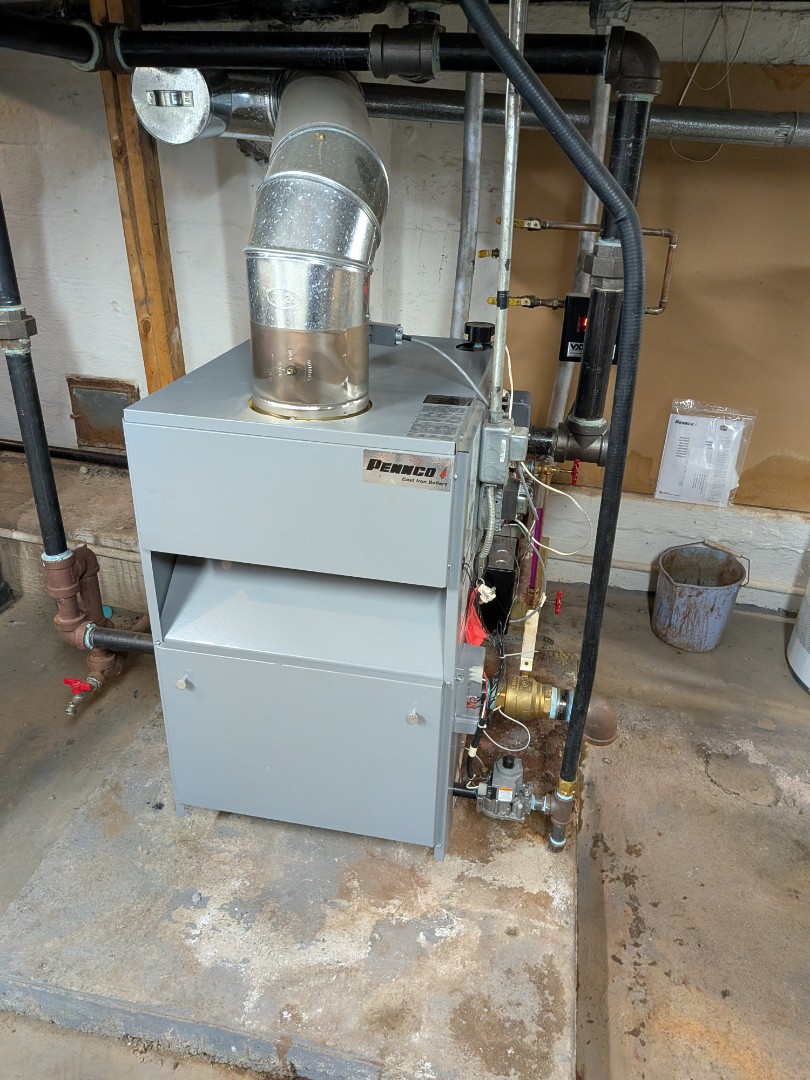 Heating service- Routine maintenance on gas Pennco steam boiler.