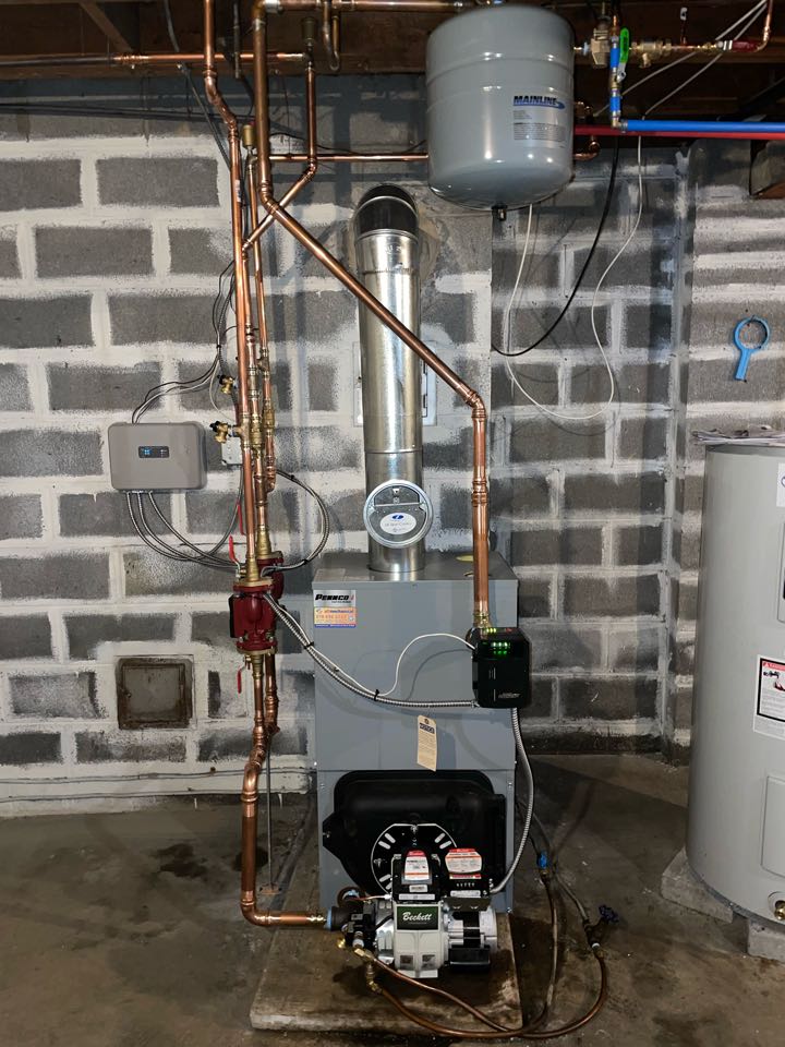 Pennco oil fired cast boiler install.