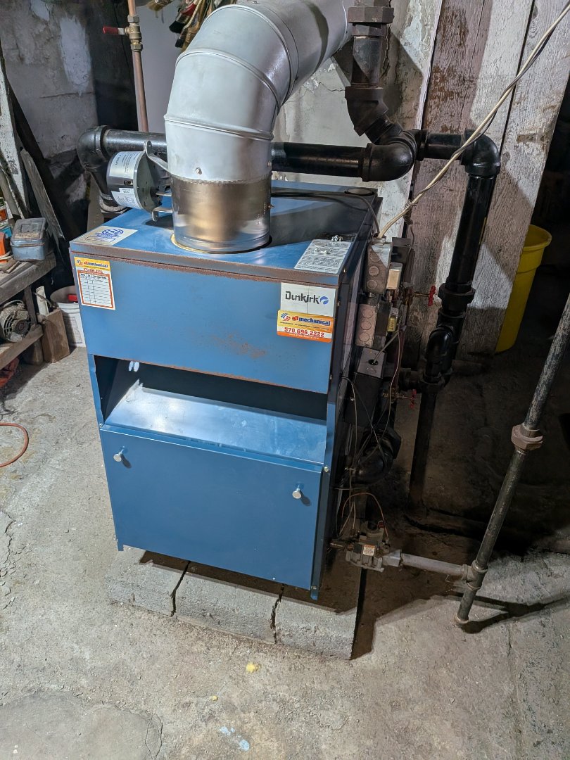 Heating service- Routine maintenance on Dunkirk gas boiler.