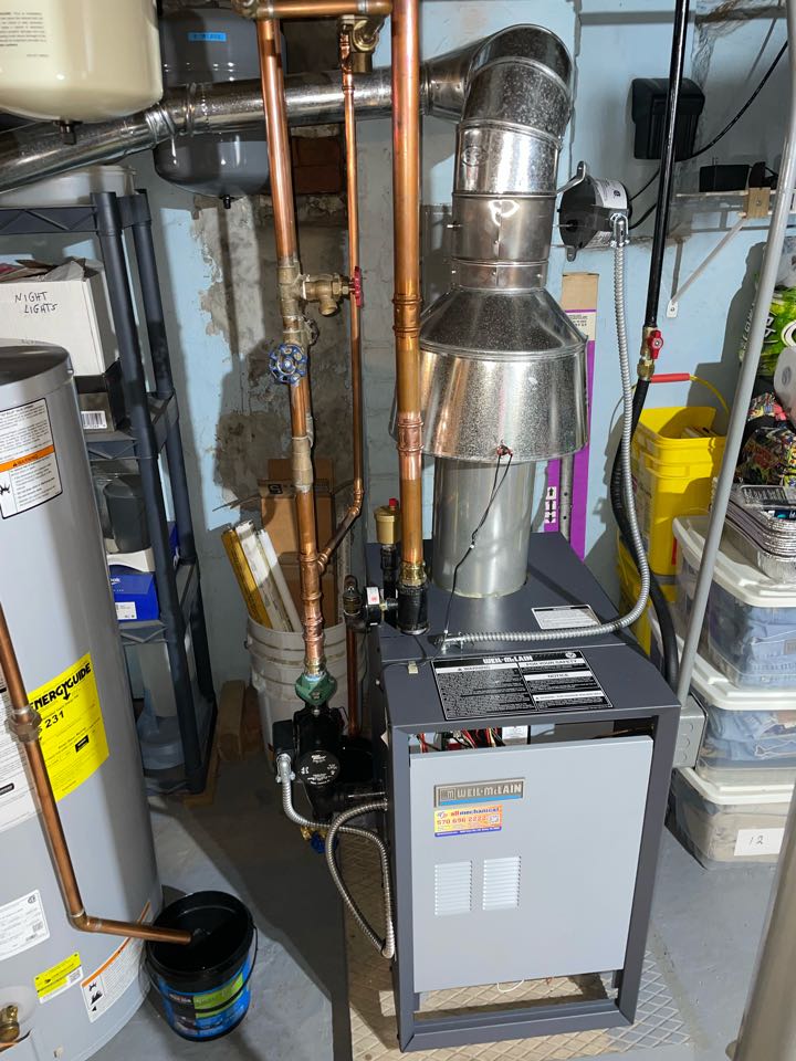 Weil McLain gas fired hot water boiler replacement.