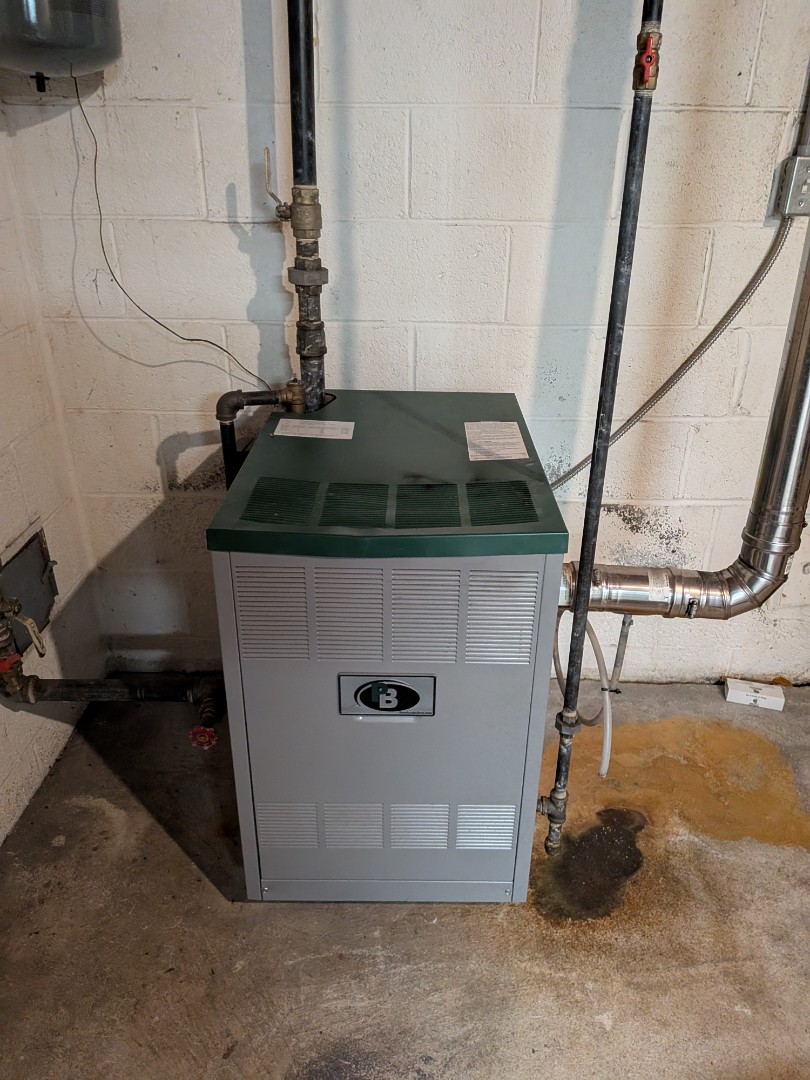 Heating service- Routine maintenance on gas peerless boiler and Amana gas furnace.