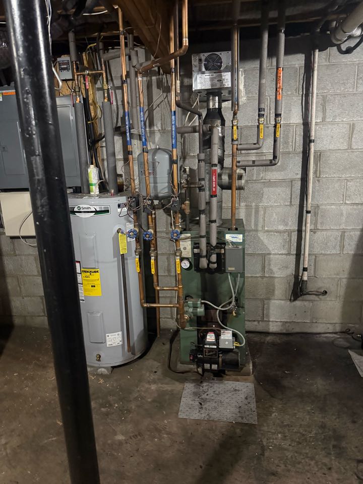 Maintenance on New Yorker Oil Fired Boiler