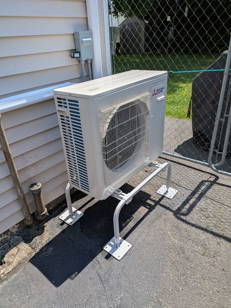 Routine maintenance on Mitsubishi Electric ductless system and Olsen oil furnace.