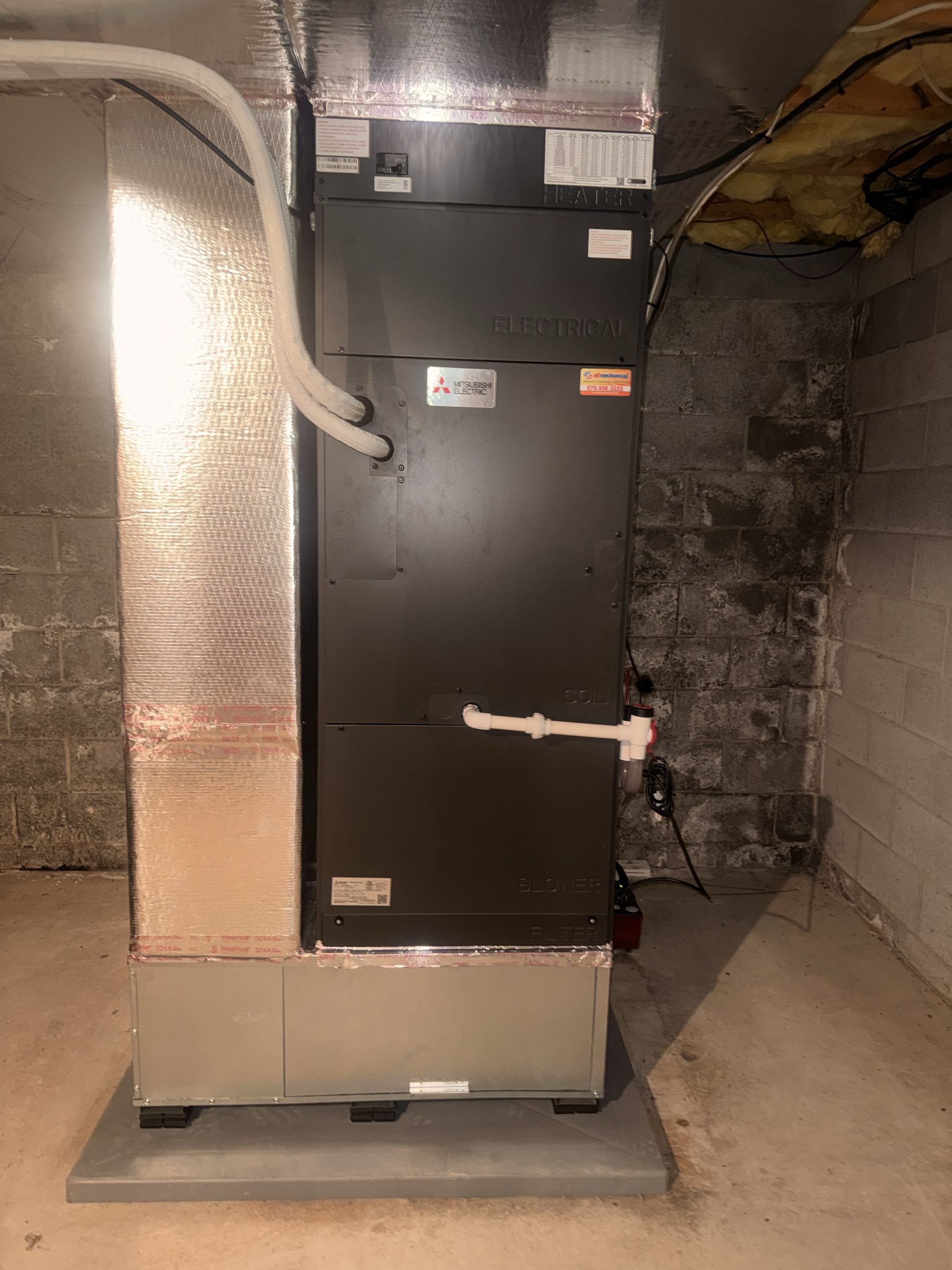 Routine maintenance on Mitsubishi Hyper Heat heat pump