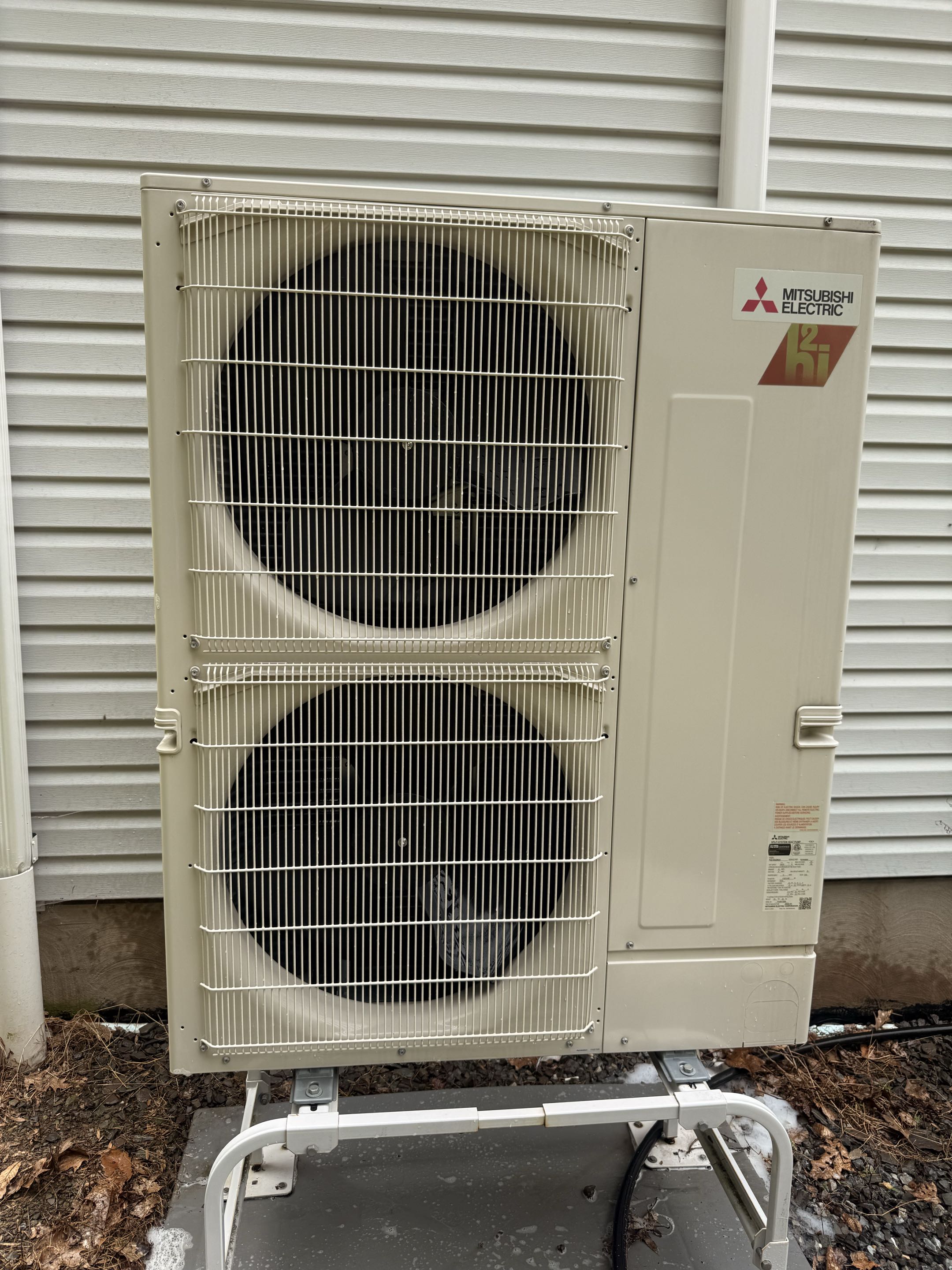 Routine maintenance on Mitsubishi heat pump 