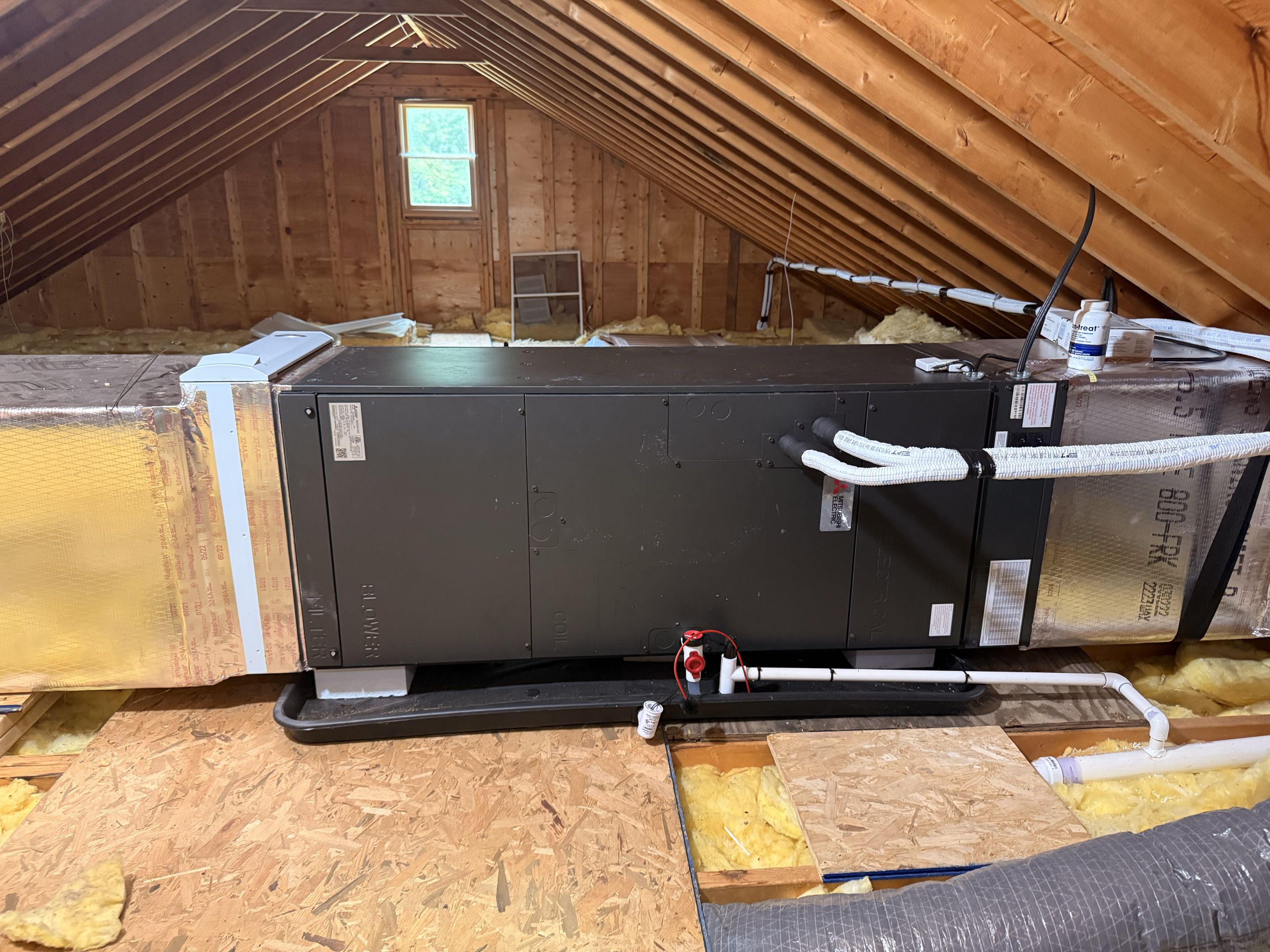 Routine maintenance on Mitsubishi heat pump 
